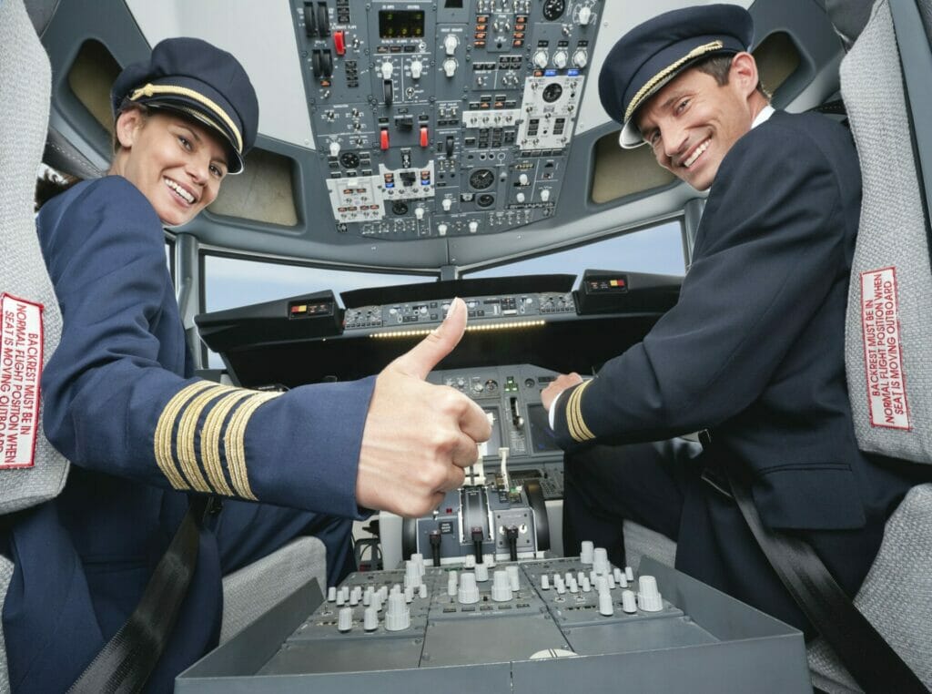 Germany, Bavaria, Munich, Pilot and co-pilot piloting aeroplane from airplane cockpit